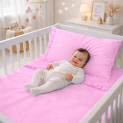 Juego de sábanas rosado con boleros para cuna