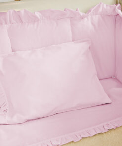 Juego de sábanas rosado con boleros para cuna