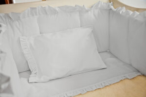 Juego de sábanas gris boleros para cuna