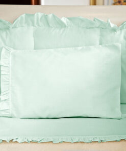 Juego de sábanas verde con boleros para cuna