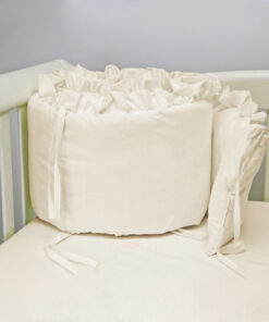 Bumper para cuna beige con boleros