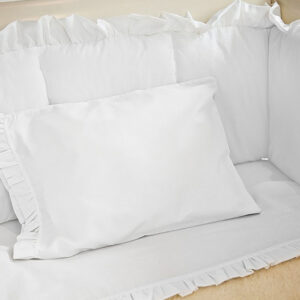 Juego de sábanas blanco con boleros para cuna