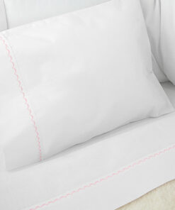 Juego de sábanas blanco con bordado rosado para cuna