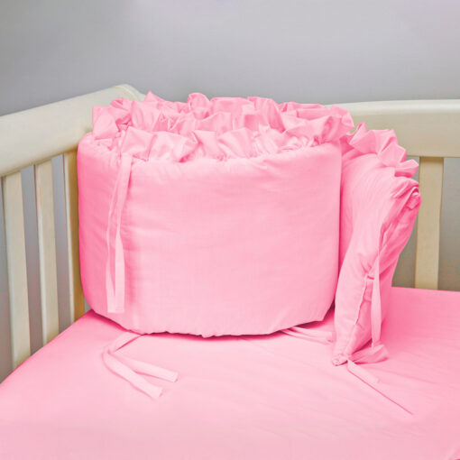 Bumper para cuna rosado con boleros