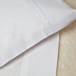 Sábana ajustable + funda para cuna blanca