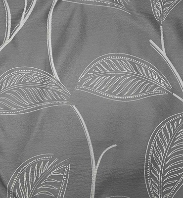 Textura de sabana gris con estampado de hojas blancas en lencería de hogar
