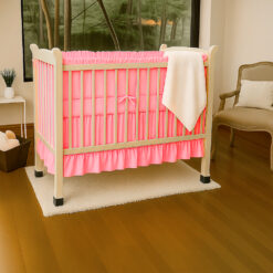 Bumper para cuna rosado con boleros