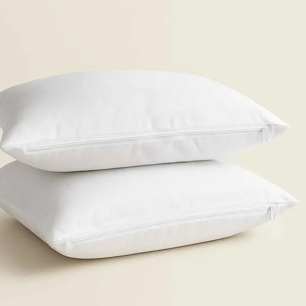 Dos protectores de almohada blancos impermeables con cierre de seguridad