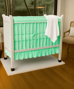 Bumper para cuna verde con boleros